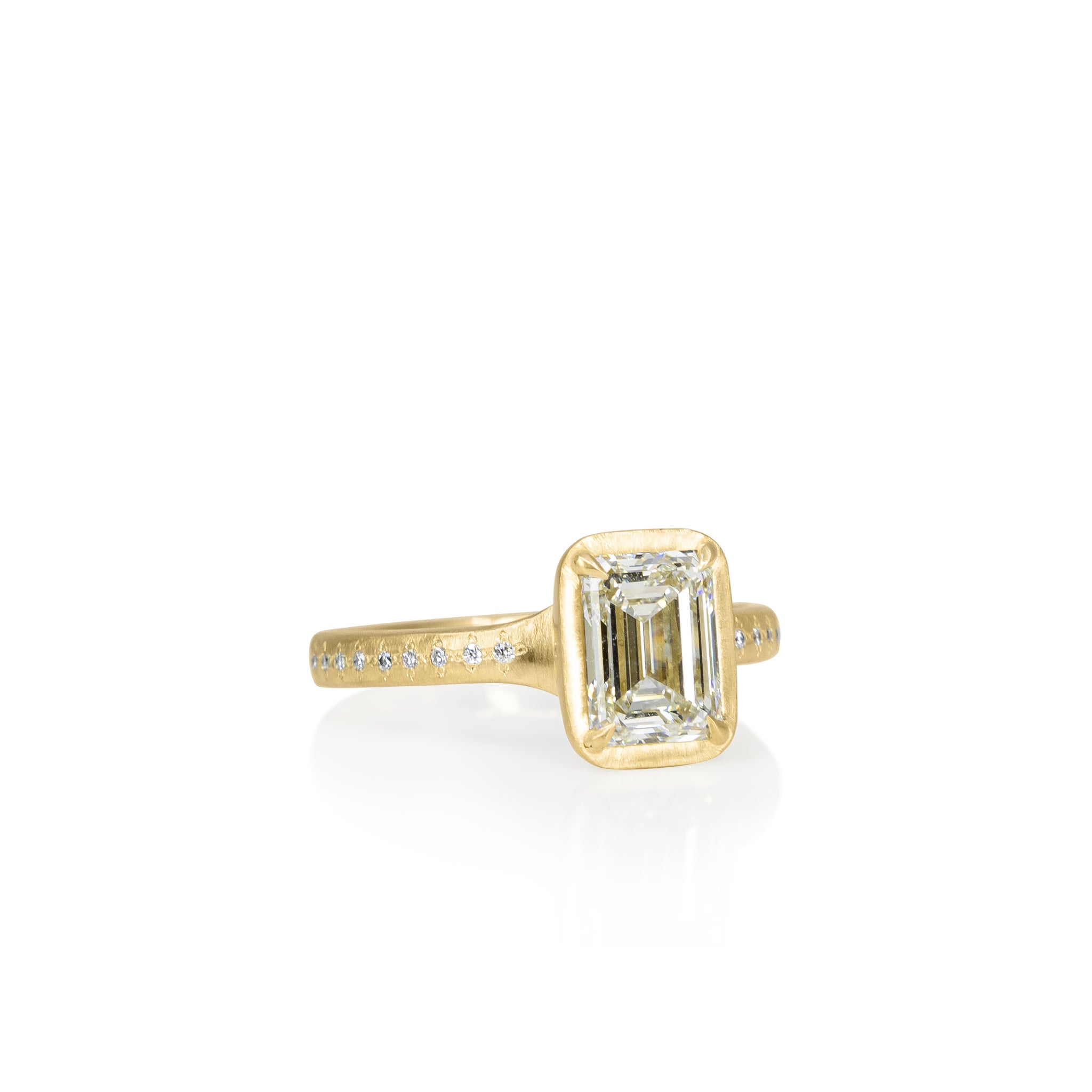 Emerald Cut Prong Succession Ring