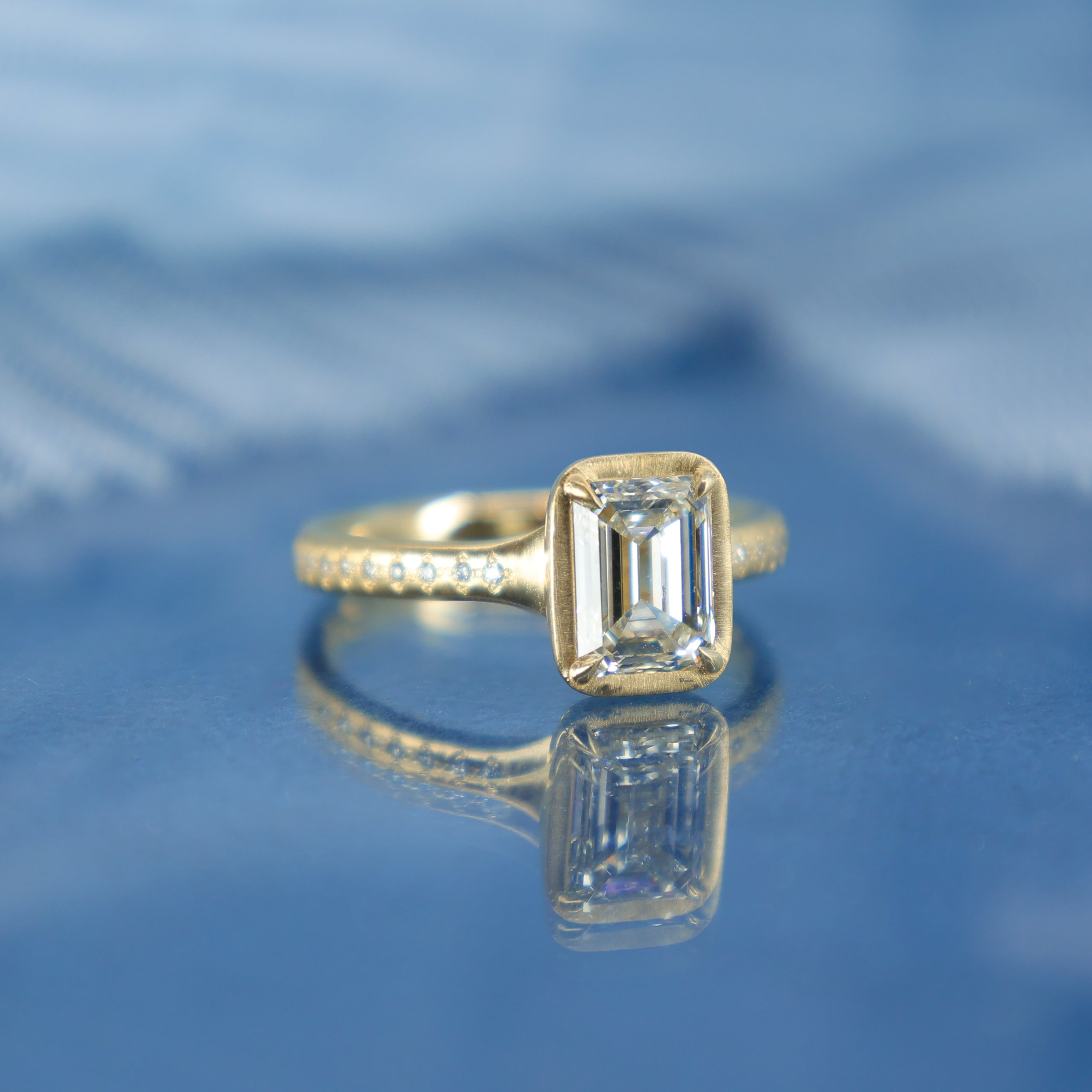 Emerald Cut Prong Succession Ring