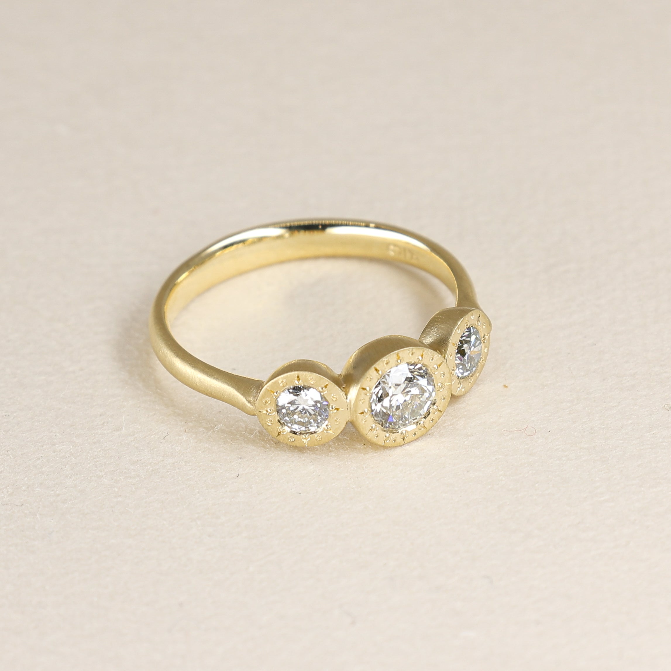 Three Stone Etched Bezel Ring