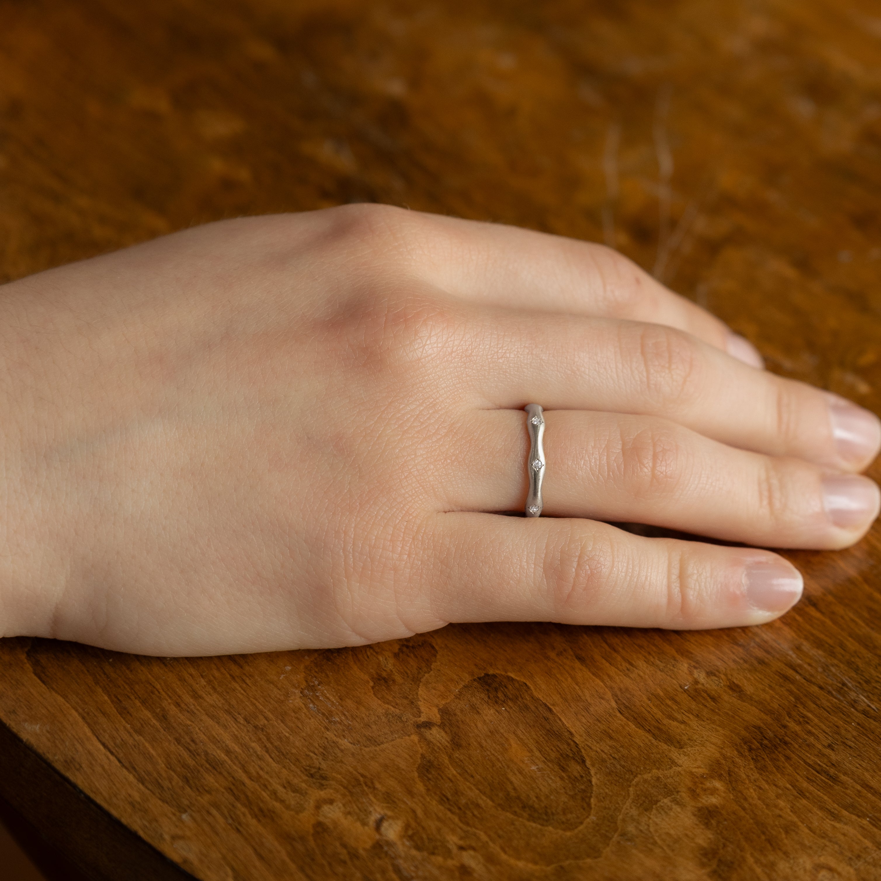 Wavy Stepping Stone Band in Platinum