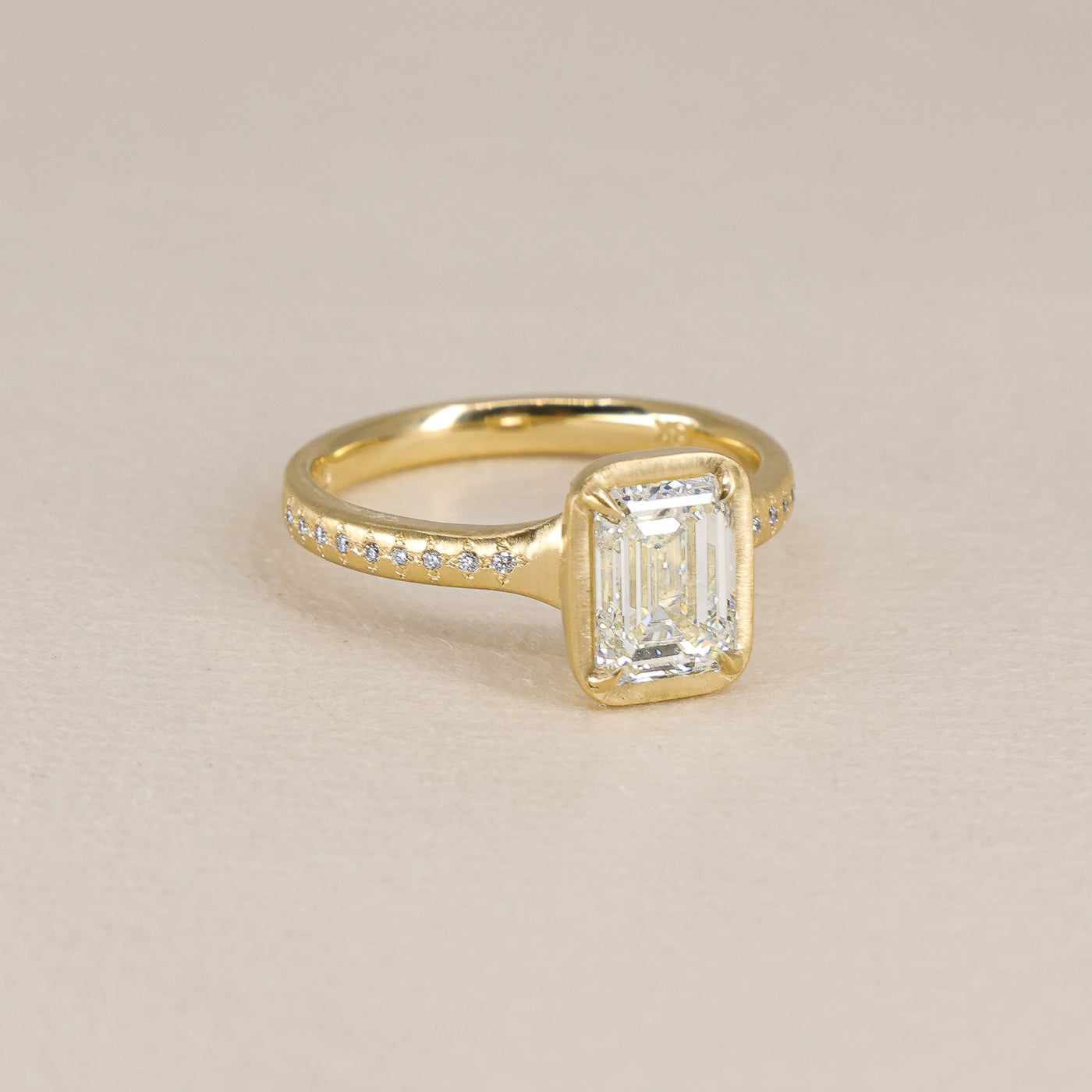 Emerald Cut Prong Succession Ring