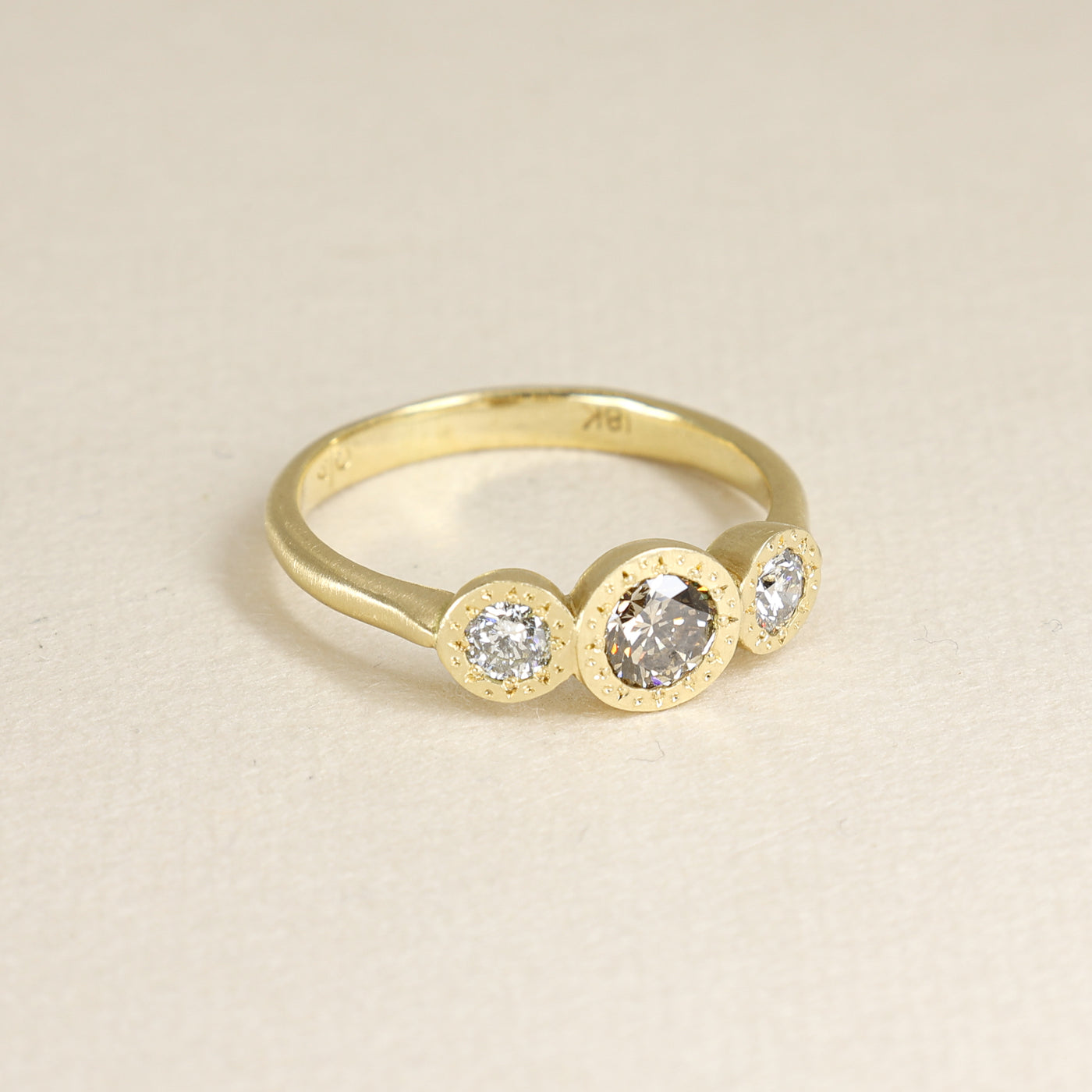 Champagne Engraved Bezel Three Stone Ring