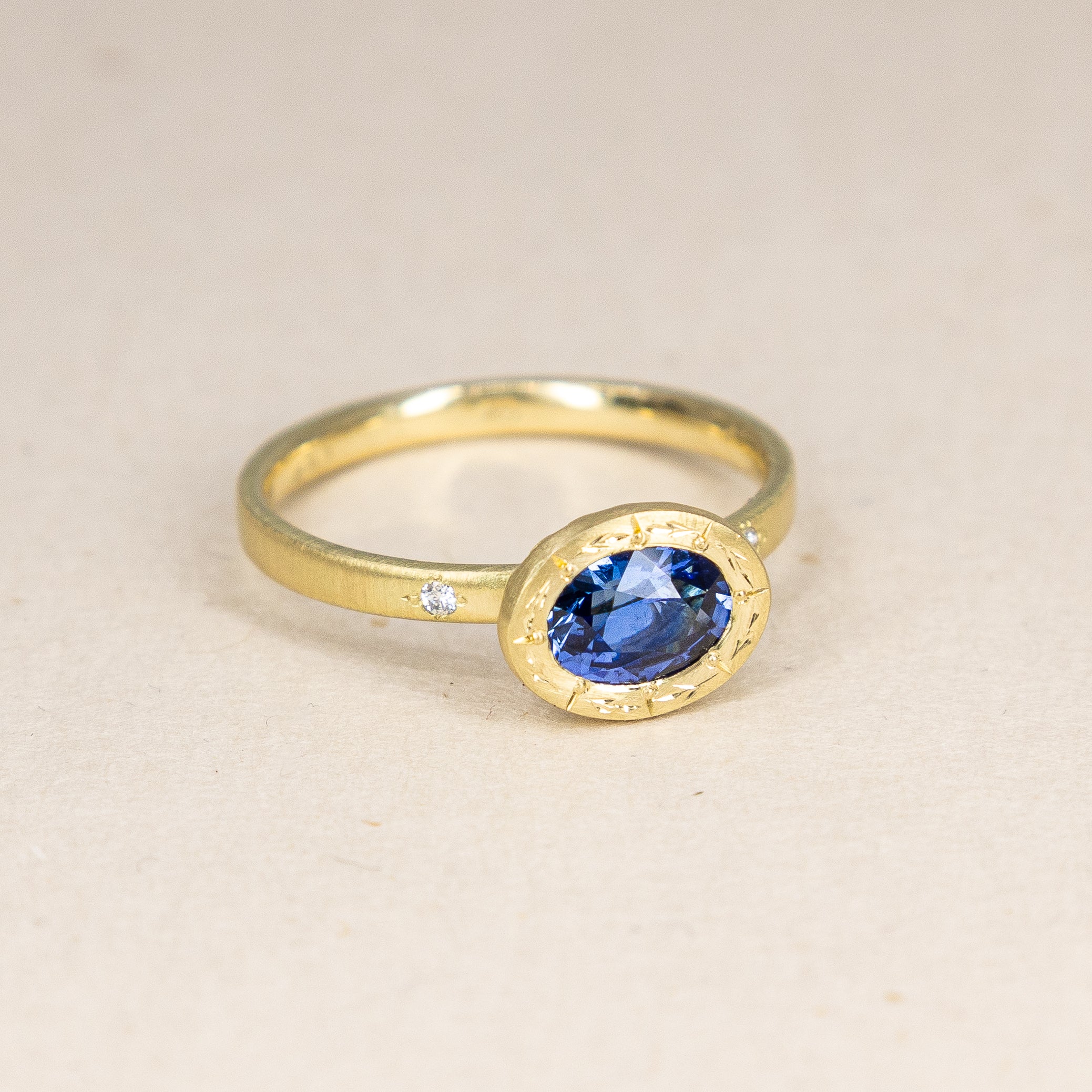 Engraved Bezel Sapphire Ring