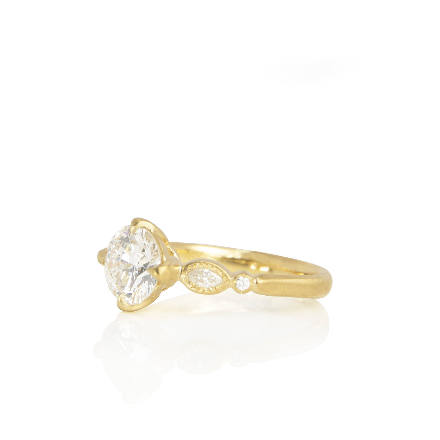 DIAMOND OVAL AND ROUND ROSEBUD SOLITAIRE