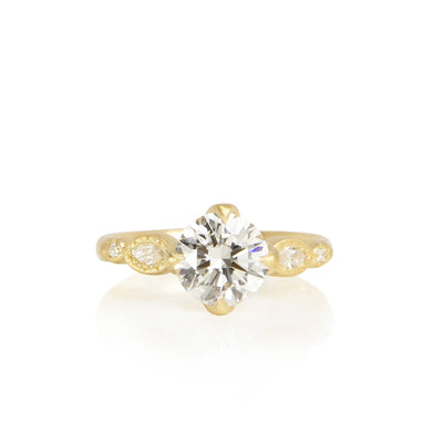 DIAMOND OVAL AND ROUND ROSEBUD SOLITAIRE